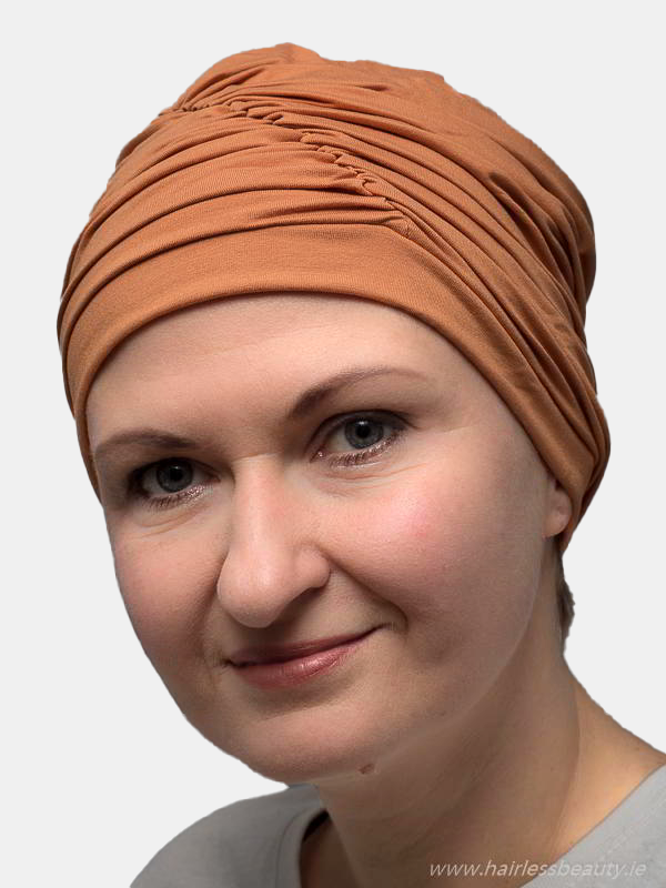 Fashionable turban for cancer patients, offering full head coverage.