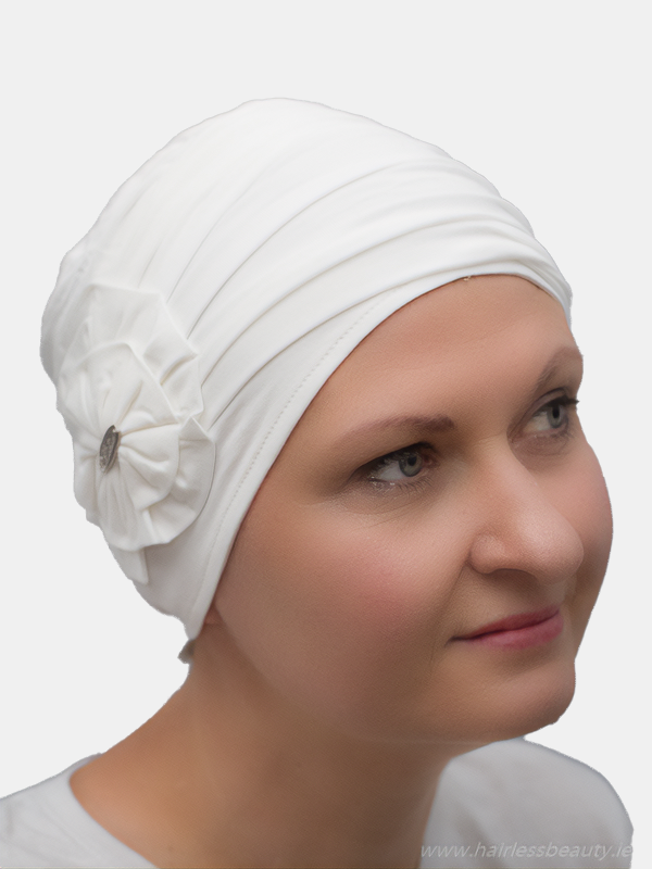 Elegant white turban with lining and draping fabric for added volume, perfect for cancer patients seeking a stylish, comfortable look