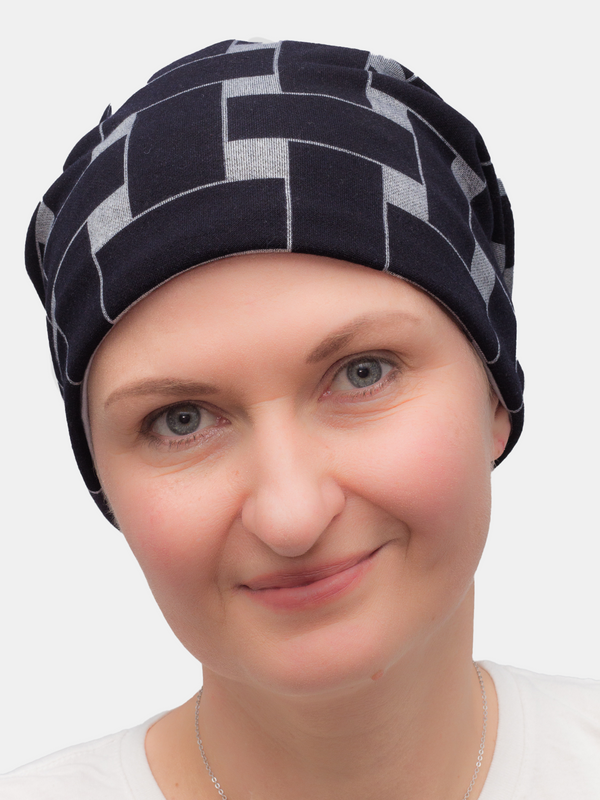 Comfy and breathable beanie hat with lining to keep warm, offering light coverage for hair loss from chemo.