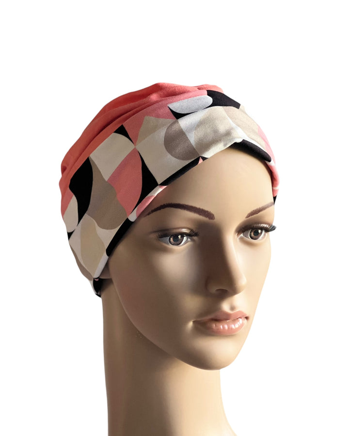 Elegant Peach Flora Bamboo turban with a soft, breathable feel, designed for cancer, chemo, and alopecia hair loss patients