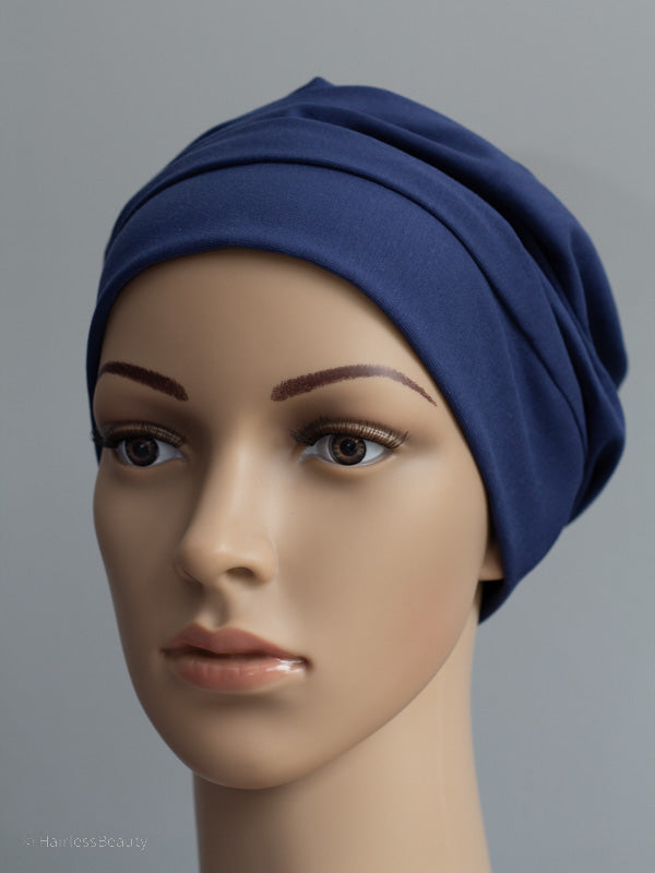 Loose, comfy beanie hat with no lining, offering warm head protection for those undergoing chemo or experiencing hair loss