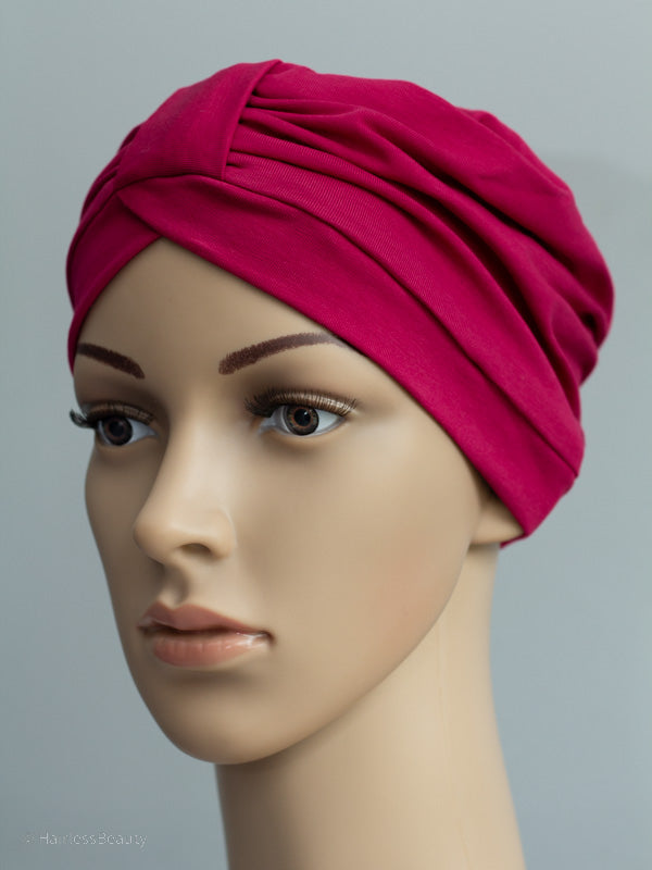 Comfy red cotton hat with decorative band, ideal for cancer and hair loss patients