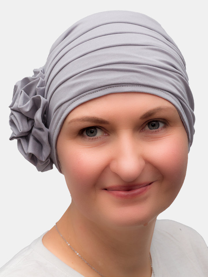 Comfortable bamboo hat with flower, great for cancer and hair loss patients